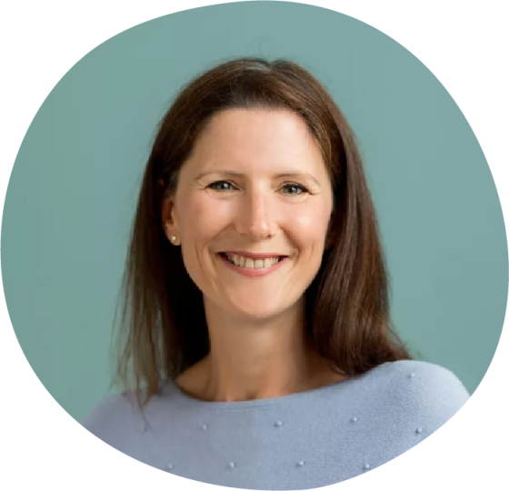 Vicky's Headshot - A woman wearing a light blue jumper, with straight dark hair is smiling at the camera Vicky's Headshot - A woman wearing a light blue jumper, with straight dark hair is smiling at the camera